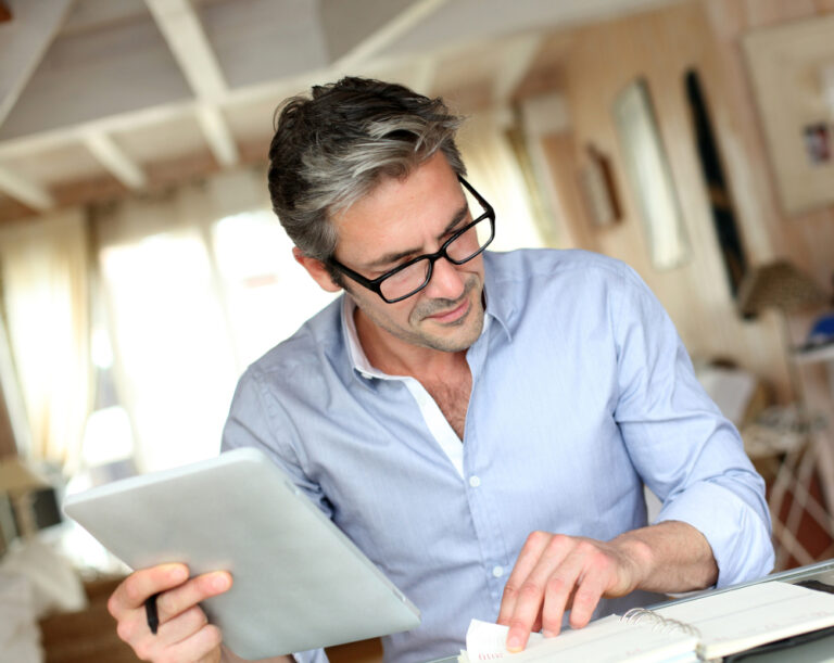 Man working from home on a tablet