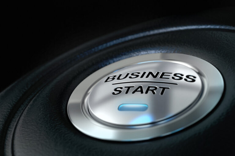 Button saying business start