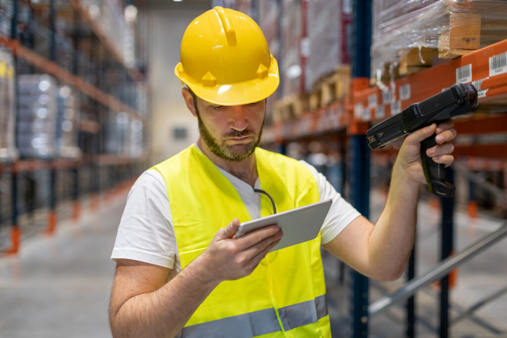 Worker picking orders in a warehouse