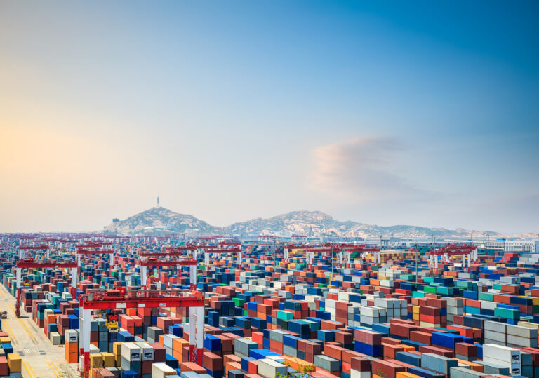 shipping container yard at dusk