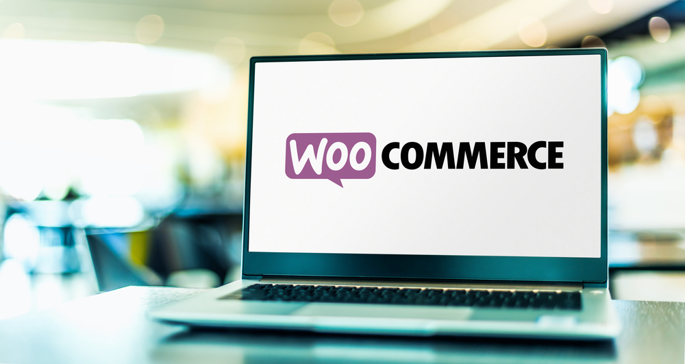 Laptop computer displaying logo of WooCommerce