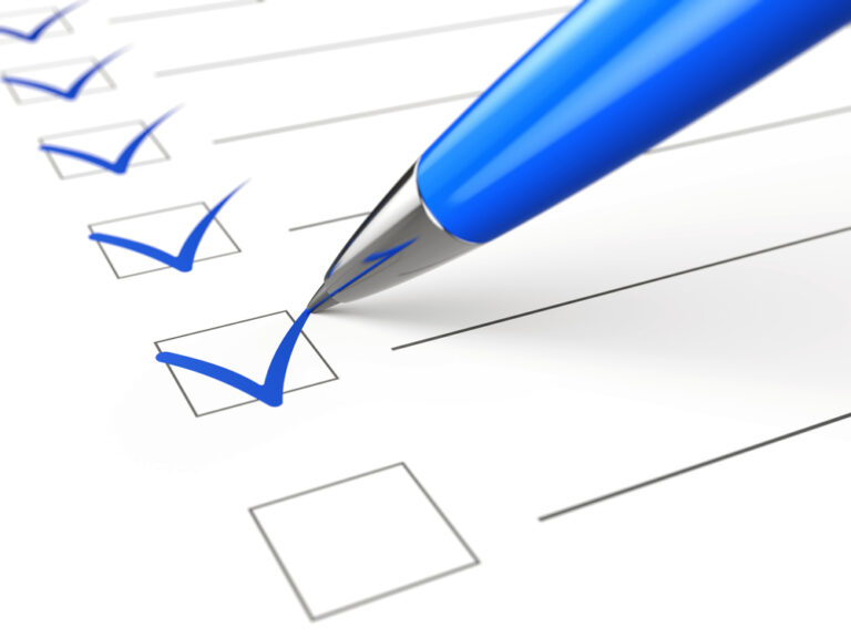 Checklist concept - checklist, paper and pen
